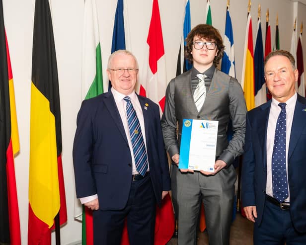 Secondary chool student Jay Curry  receiving his Rotary Youth Leadership Development award from Kenny Fisher, District Governor of Rotary Ireland and Patrick O’Riordan, Head of Public Affairs with the European Parliament in Ireland,  at an event at Europe House in Dublin recently. [Photo: Collette Creative Photography]