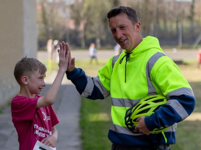 High fives at the Caina Healey Children's Try-a-Tri, a special event organised by the Bogside and Brandywell Health Forum in partnership with the Danny Quigley Fund.