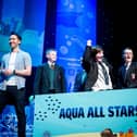 Students from St Joseph's Boys' School, St. Patrick’s College Dungiven, St Columb's College, Gaelcholáiste Dhoire, Strabane Academy celebrate a winning answer in the Water Warriors Aqua All Stars game