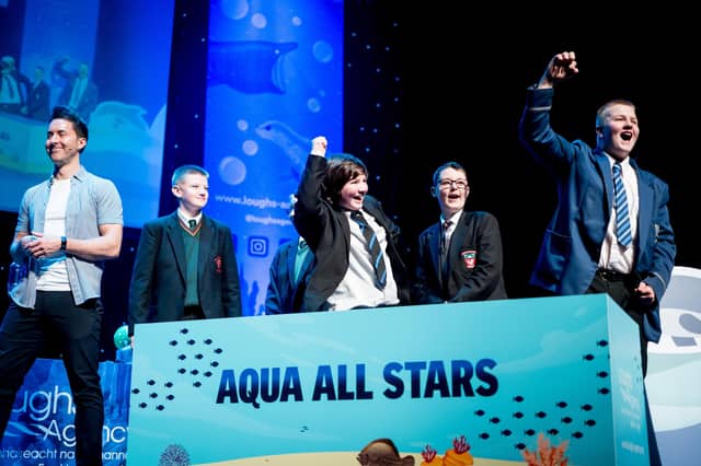 Students from St Joseph's Boys' School, St. Patrick’s College Dungiven, St Columb's College, Gaelcholáiste Dhoire, Strabane Academy celebrate a winning answer in the Water Warriors Aqua All Stars game