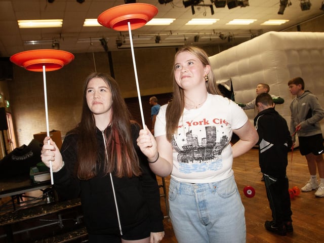 Practising their circus skills during Saturday's BBQ are Chloe McGill and Aine Muldoon.