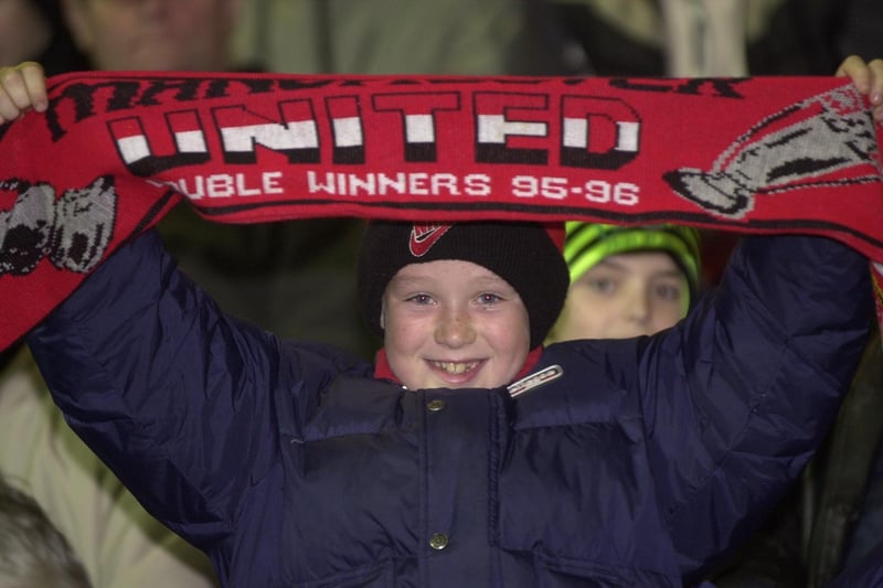 A young Manchester United fan at the Brandywell.