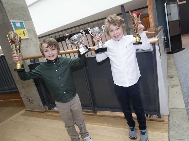 Two young brothers celebrating success at Saturday's Feis in the Millennium Forum.