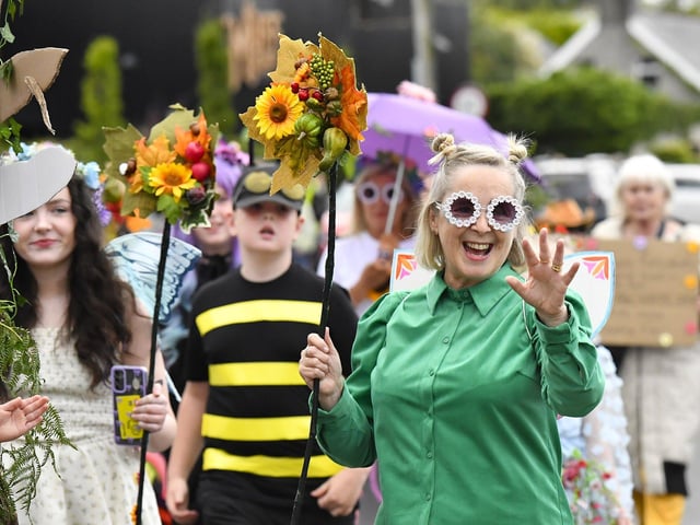 Muff Feile opening parade makes its way through the village on Friday evening. Photo: George Sweeney