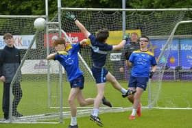 Lumen Christi College take on St Columb’s  ‘B’ during the annual Brian Og McKeever Memorial year 10 tournament held at Pairc Bhrid, Steelstown. Photo: George Sweeney