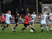 Shelbourne pair Shane Farrell and Kameron Ledwidge close in on Derry City’s Paul Mullan.. Photo: George Sweeney