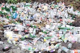 A woman has expressed shock after hundreds of empty alcohol bottles were fly-tipped on the country road at Mannerstown on the Donegal side of the border