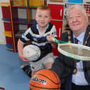 Ruairi McLaughlin with the Mayor, Councillor Steven Callaghan at the unveiling of the new multi-use games area at Magilligan Community Centre.