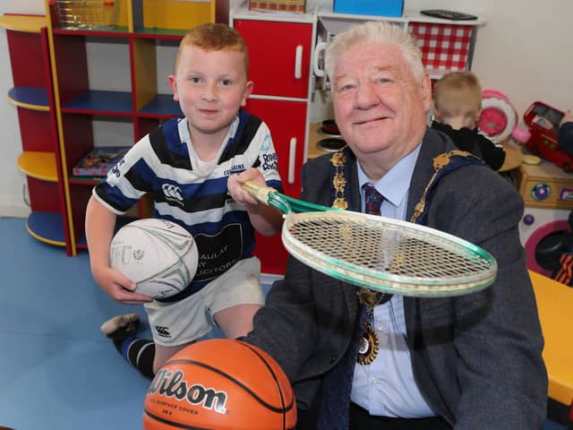 Ruairi McLaughlin with the Mayor, Councillor Steven Callaghan at the unveiling of the new multi-use games area at Magilligan Community Centre.