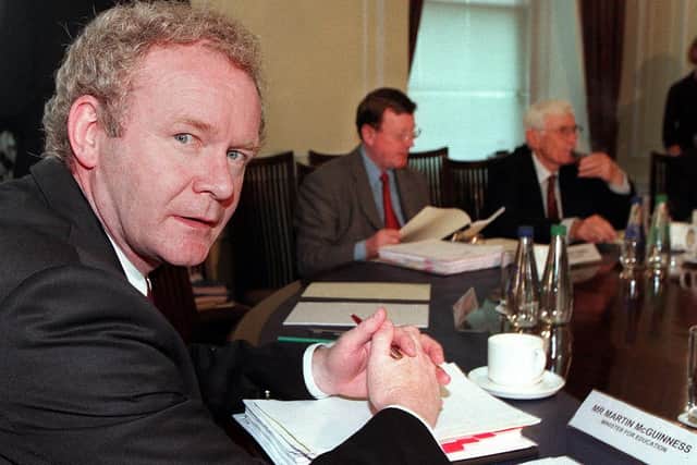 Martin McGuinness with First Minister David Trimble and Deputy First Minister Seamus Mallon in 2000. (Photo by PAUL FAITH/POOL/AFP via Getty Images)