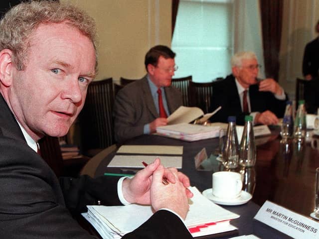 Martin McGuinness with First Minister David Trimble and Deputy First Minister Seamus Mallon in 2000. (Photo by PAUL FAITH/POOL/AFP via Getty Images)