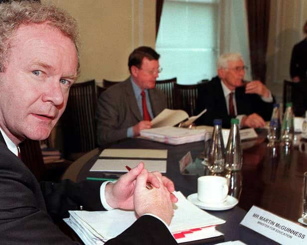 Martin McGuinness with First Minister David Trimble and Deputy First Minister Seamus Mallon in 2000. (Photo by PAUL FAITH/POOL/AFP via Getty Images)