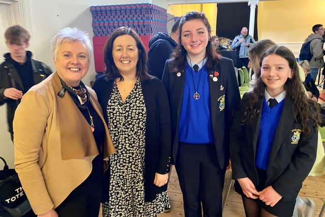 Joint CEO of IDP Shauna McClenaghan, Scoil Mhuire teacher Katrina McGonigle and students Jenny Ward and Ora Barron