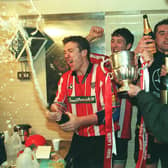 Liam Coyle celebrates winning the league title in 1997 - the last time the Candy Stripes lifted the Premier Division trophy.