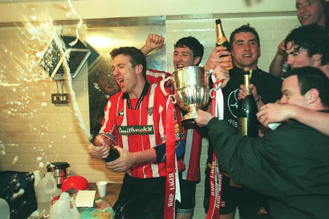 Liam Coyle celebrates winning the league title in 1997 - the last time the Candy Stripes lifted the Premier Division trophy.