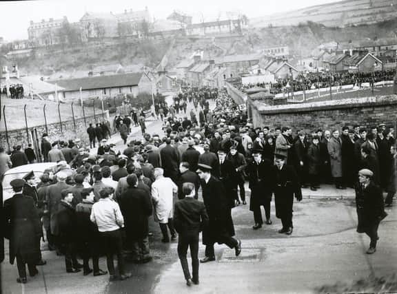 The tremendous interest in an Irish League game between Derry City and Linfield is reflected in this picture taken outside the ground half an hour before kickoff in 1966. The attendance was a record for an Irish League fixture at Brandywell.
