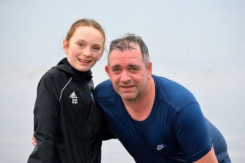 Elle and Gary Duffy from Buncrana took part the annual Christmas morning charity swim at Ludden beach. Photo: George Sweeney. DER2252GS – 29