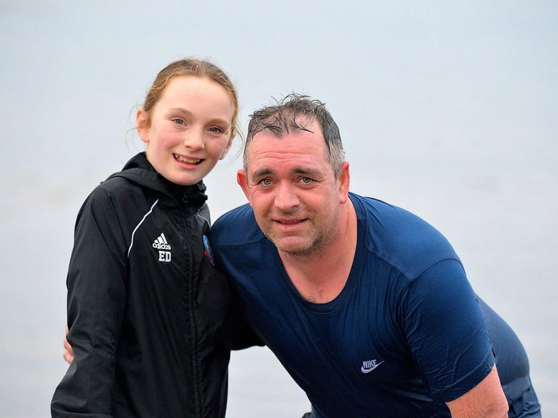 Elle and Gary Duffy from Buncrana took part the annual Christmas morning charity swim at Ludden beach. Photo: George Sweeney. DER2252GS – 29