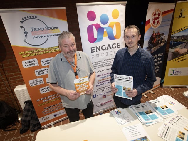 Pictured at the Dove House stall is Boby Qugley and at the Engage Project stall, Barry McCabe on Tuesday night.