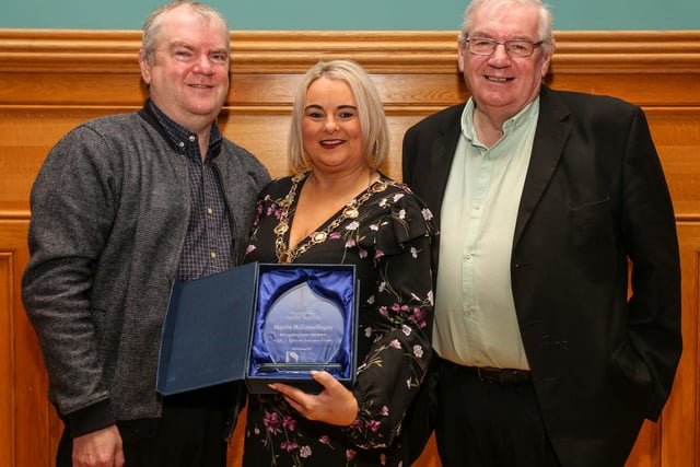 The Mayor of Derry City and Strabane, Councillor Sandra Duffy, making a presentation to Martin McConnellogue, at a reception in the Guildhall in recognition of his commitment to LGBT+ Rights and Trade Union Activism. Included is Martin’s brother, John McConnellogue.