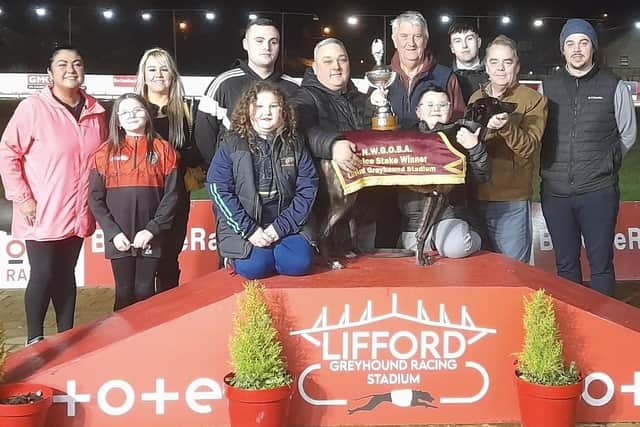The N.W.G.O.B.A 325 Final winner at Lifford, Droopys Cynthia pictured with Clare Coyle, Nathan Coyle, Charles Coyle (holding trophy), Kieran Coyle, Shane Coyle (holding the winner), Paul Magee (second from right) representing the NWGOBA and Spencer Saberton, (Lifford Stadium) on right.