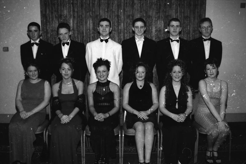 Seated, from left, Jennifer Thompson, Danielle McKinney, Louise Clarke, Siobhan O'Reilly, Nicola McMonagle and Natalie Crumlish. Standing, from left, Michael Diver, Tommy Gallagher, Leo Carlin, Raymond McDermott, Shaun Heaney and Delclan McCarron, at the St. Brigid's High School Formal in January 1998.