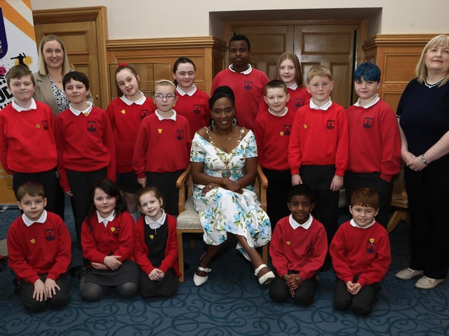 Mayor Lilian Seenoi Barr with student council members from Lisnagelvin PS when they visited the Mayor's Parlour. Included, on Mrs. O'Hara, teacher and on left, Helena Boyle, school secretary.