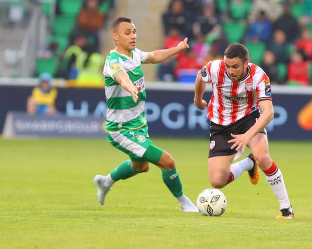 Michael Duffy skips past the challenge of Shamrock Rovers' Graham Burke. Photos by Kevin Moore.