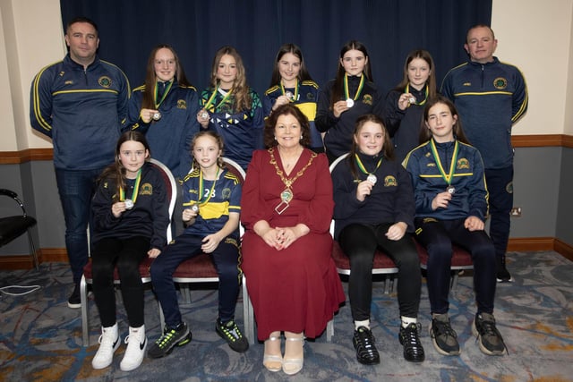 The Mayor of Derry City and Strabane District Council, Patricia Logue pictured with Don Boscos u-12s, runners up in the Winter Cup. Included are coaches Aaron Starrs and Marty Mooney.