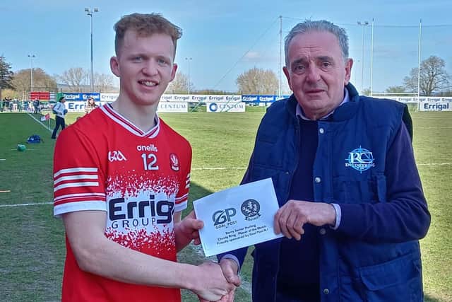 Darragh McGilligan, Man of the Match in Saturday's Christy RIng Cup games against Tyrone, receives his award from Jimmy Shaw, representing sponsors, Goal Post NI.
