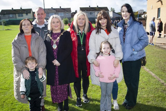 The Mayor of Derry City and Strabane District Council, Sandra Duffy and Mrs. Ciara Deane, Principal, St. Joseph’s Boys School pictured on Saturday at the Sean O’Kane Memorial tournament at the school with members of the O’Kane family.
