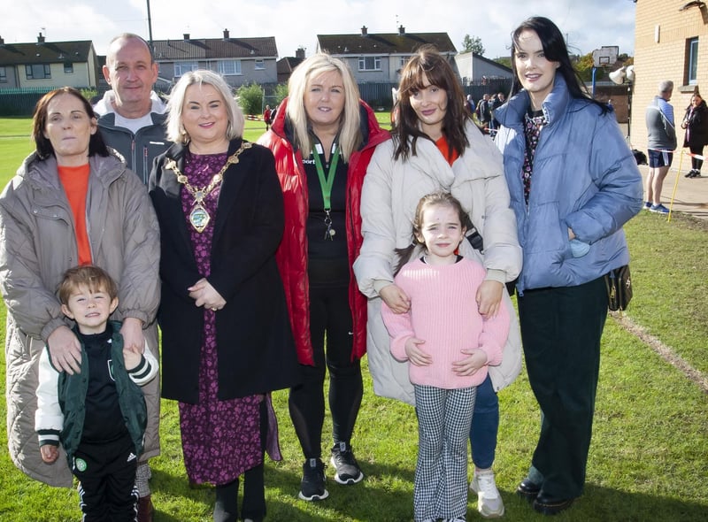The Mayor of Derry City and Strabane District Council, Sandra Duffy and Mrs. Ciara Deane, Principal, St. Joseph’s Boys School pictured on Saturday at the Sean O’Kane Memorial tournament at the school with members of the O’Kane family.