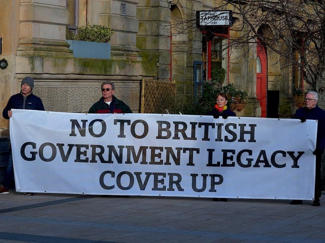 Relatives of victims of the troubles protest against the proposed Northern Ireland Troubles (Legacy and Reconciliation) Bill, organised by The Bloody Sunday Trust and the Pat Finucane centre, at Guildhall Square on Wednesday afternoon. DER2247GS – 59