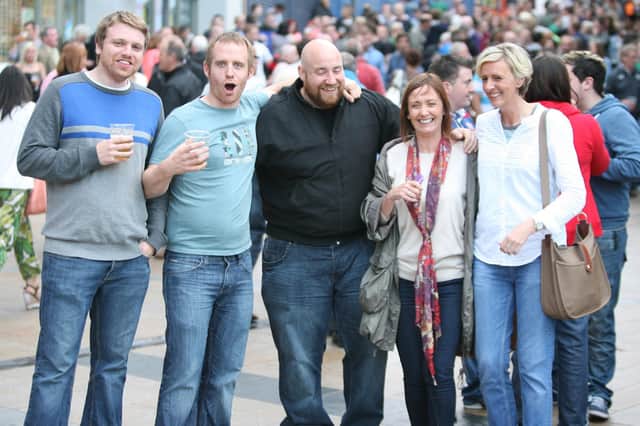 Enjoying Sunday's festivities in Waterloo Place on Sunday afternoon, are from left, Barry Harkin, Stephen McGregor, Gavin Doherty, Angie O'Doherty and Katy McBride. DER3313JM031