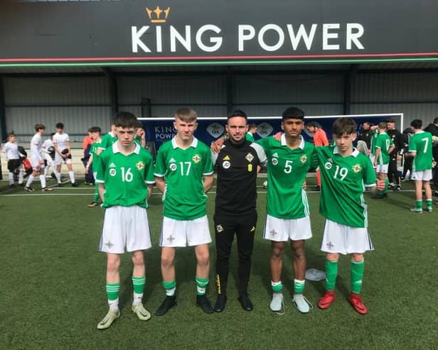Derry City teenagers Callum Downey, Glenn McCourt, Aron KC and Oliver Devlin, alongside City U14 manager and N Ireland U16 coach, Neil McCafferty, during the training camp in Leuven.