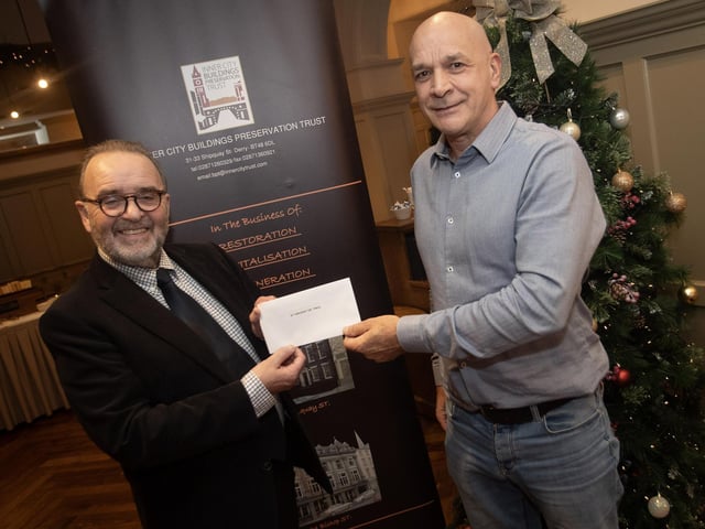 John Meehan, Inner City Trust, pictured handing over a cheque to Sean Gallagher, St. Vincent de Paul, at the Bishop's Gate Hotel, Derry on Thursday afternoon last. The event was part of the Inner City Trust's Annual Charity Giving. (Photos: Jim McCafferty Photography)