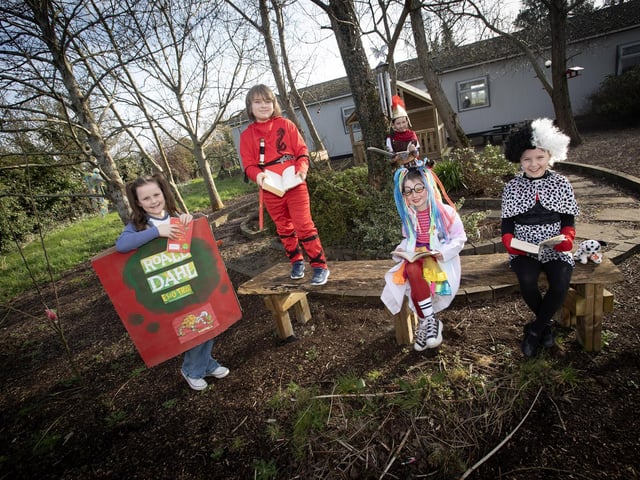 Making use of the sunshine and some great outdoor spaces during World Book Day at Hollybush PS.