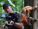 Cameraman filming a Coconut Crab on Christmas Island in the Indian Ocean