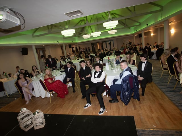 Enjoying the entertainment at the St. Joseph's Boys School Formal at the Waterfoot Hotel on Friday night. : .