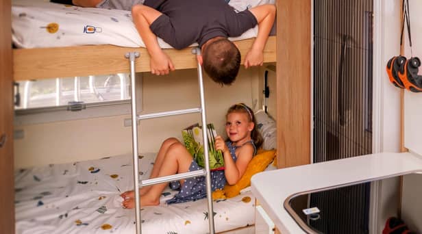 Ultimate Adventure Van from Camplify with comfy beds for the children