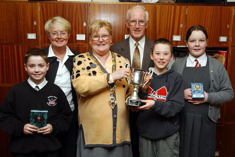 The Mayor of Derry, Councillor Kathleen McCloskey, presenting the first prize in the Primary Schools Home Accident Prevention Public Speaking Final to Owen McConnell (Fountain PS). Included are, from left, Matthew Smyth (Newbuildings PS), runner-up, Collette Craig, organiser, Albert Smallwoods, chairman, Home Accident Prevention committee, and Clare McGrory (Holy Family PS), third.