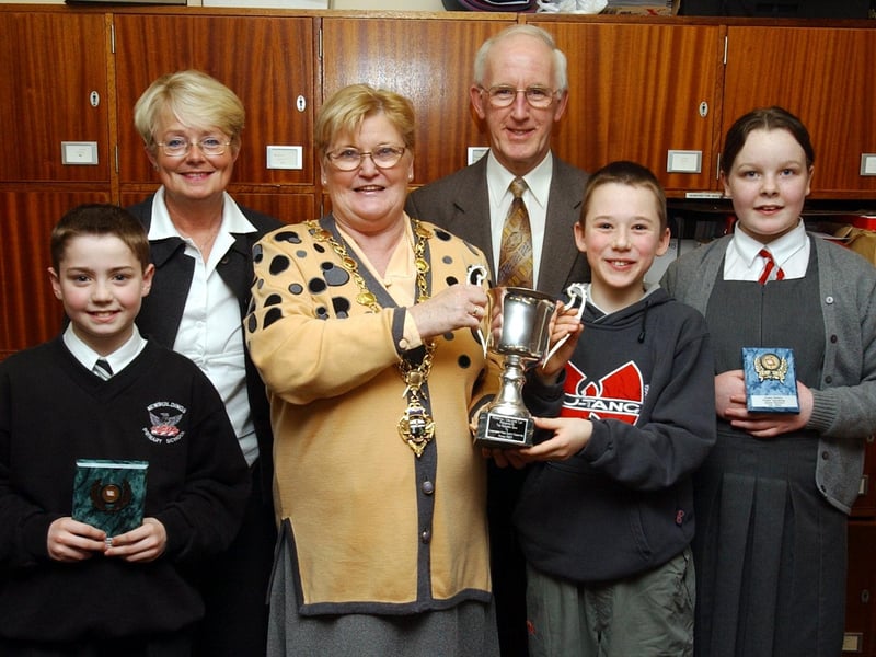 The Mayor of Derry, Councillor Kathleen McCloskey, presenting the first prize in the Primary Schools Home Accident Prevention Public Speaking Final to Owen McConnell (Fountain PS). Included are, from left, Matthew Smyth (Newbuildings PS), runner-up, Collette Craig, organiser, Albert Smallwoods, chairman, Home Accident Prevention committee, and Clare McGrory (Holy Family PS), third.