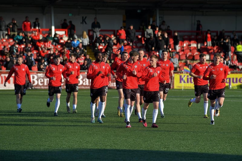 Derry City players finish there warm-up prior to the game against Dundalk on Monday evening. Photo: George Sweeney.  DER2320GS – 44