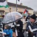 White crosses were carried at the head of the march.
