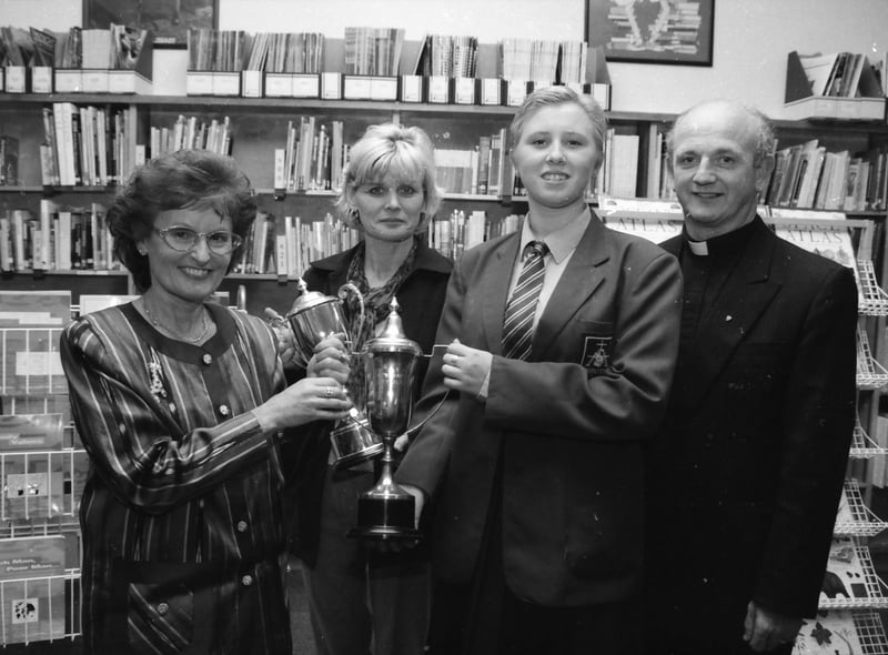 Geraldine Keegan presenting the Headmistress' Special Award for Commitment to Noelle Robinson. Included Claire McNabb and Fr. Brian Brady.