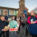 Colin Hipson, Customer Service Co-ordinator, Translink pictured with Teresa Cunningham, Ethical Weigh Co-operative, Mark Denham, Ethical Weigh Co-operative; Patricia Cassidy with son Fionn (8),  Solas Bath | Body | Home; Monica Downey Life Cycles and Mrgahid Ali Life Cycles. Photo: Martin McKeown.