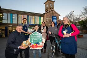 Colin Hipson, Customer Service Co-ordinator, Translink pictured with Teresa Cunningham, Ethical Weigh Co-operative, Mark Denham, Ethical Weigh Co-operative; Patricia Cassidy with son Fionn (8),  Solas Bath | Body | Home; Monica Downey Life Cycles and Mrgahid Ali Life Cycles. Photo: Martin McKeown.
