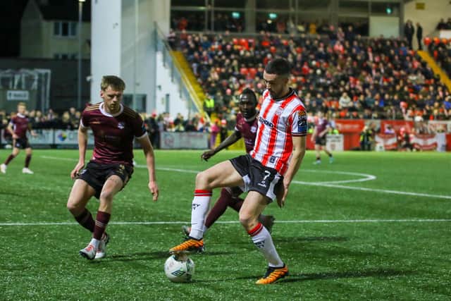 Derry City winger Michael Duffy can't find a way through a resolute Galway defence at Brandywell last March.