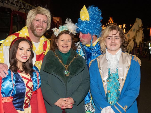 Mayor Patricia Logue with festive characters at the Procession.
