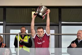 Slaughtneil captain Mark McGuigan lifts the Derry Senior Hurling Championship Cup after defeating Kevin Lynchs'. Photo: George Sweeney